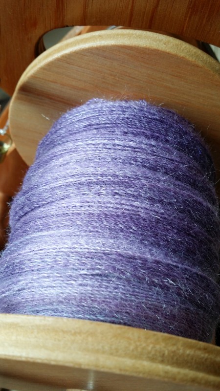 The plied yarn on the bobbin