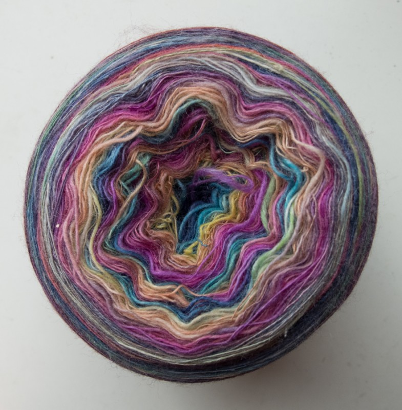 Yarn cake of singles