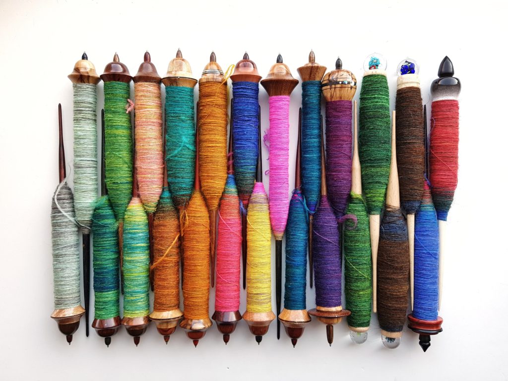 24 spindles filled with singles in all colours of the rainbow