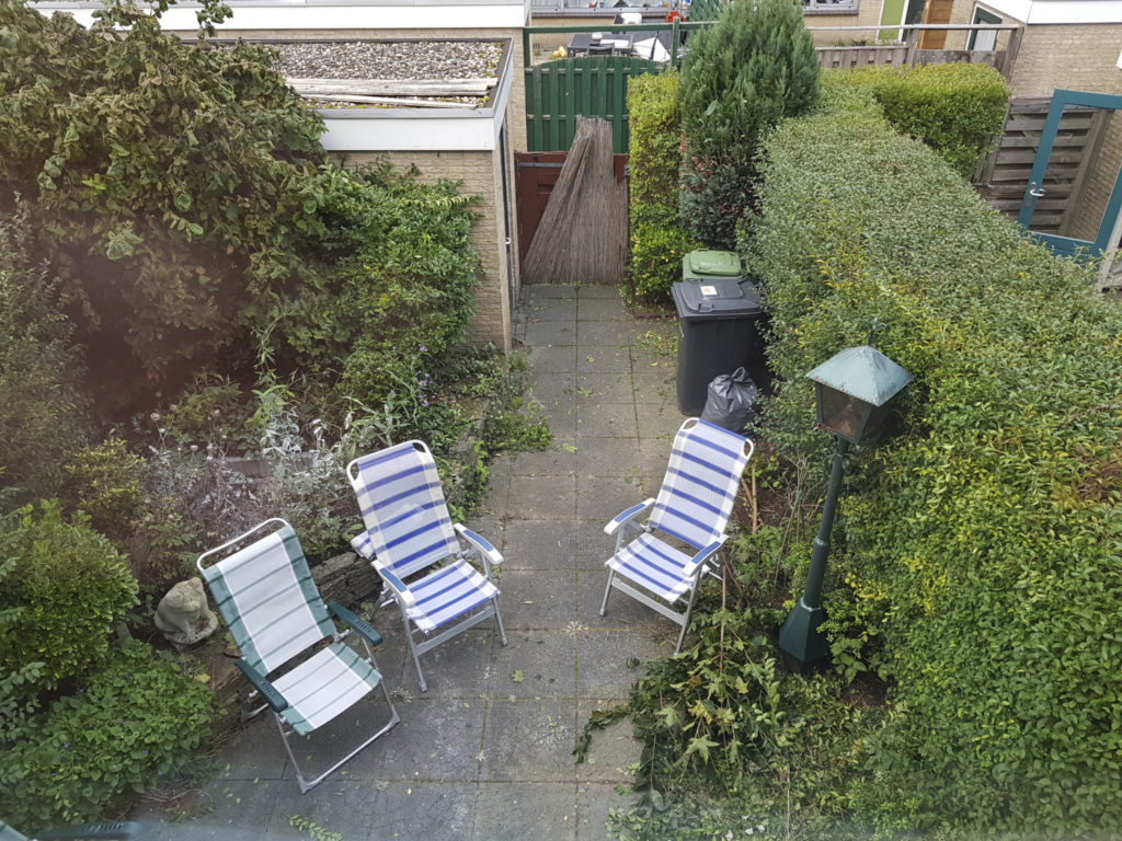 Our backyard, with some garden chairs