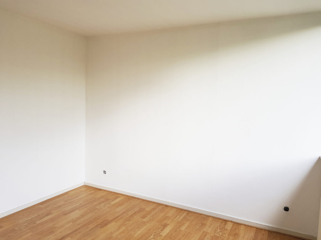 A view of the painted bedroom. It is nice and light.